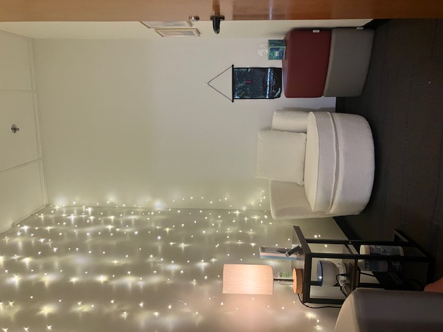 sensory room with comfortable seating and calming lighting